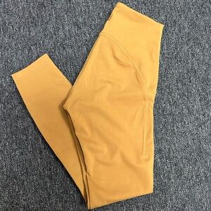 Lululemon InStill High-Rise leggings in a copper color